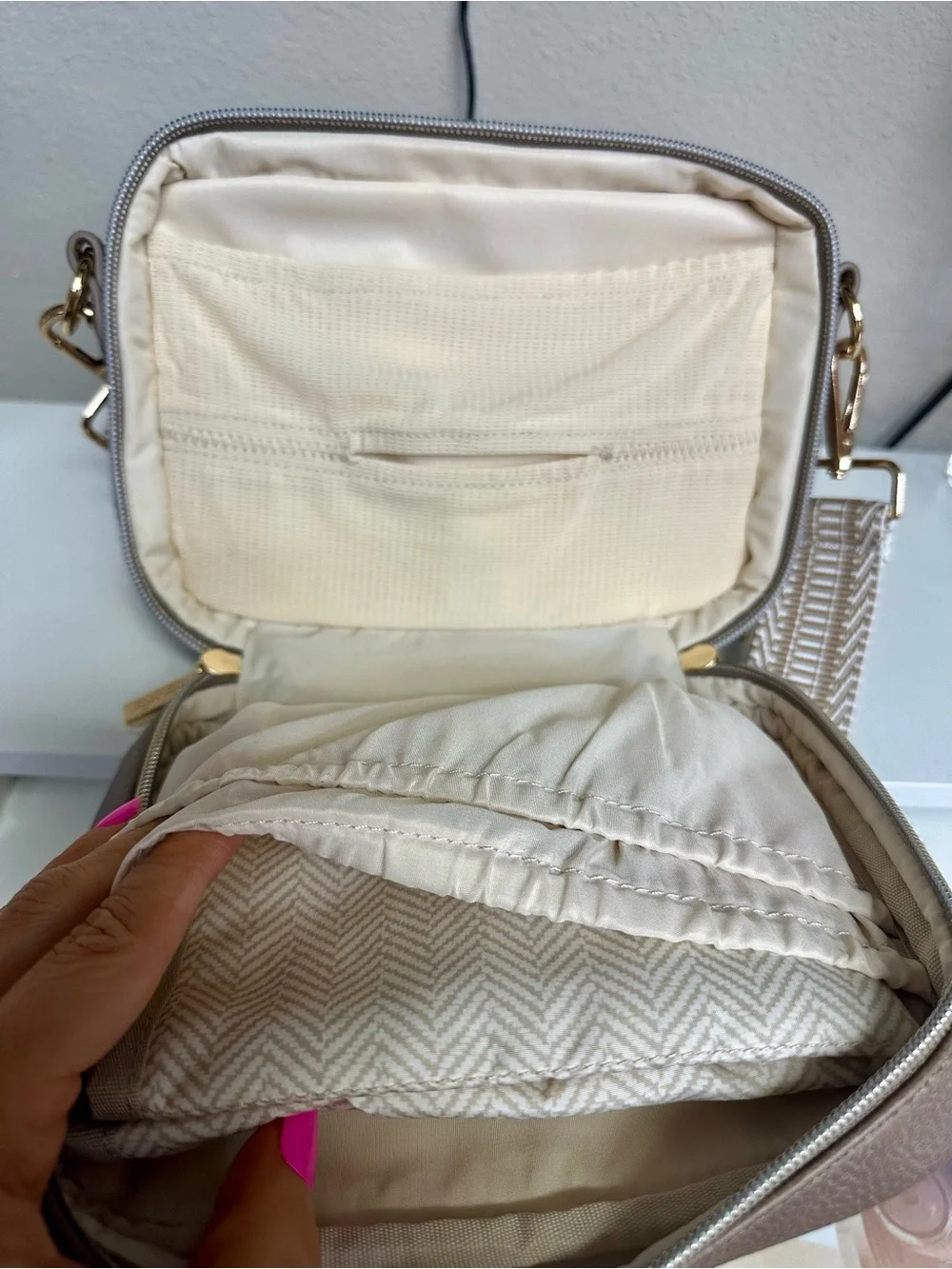 Itzy Ritzy Quilted Crossbody Bag in Taupe with Woven Strap